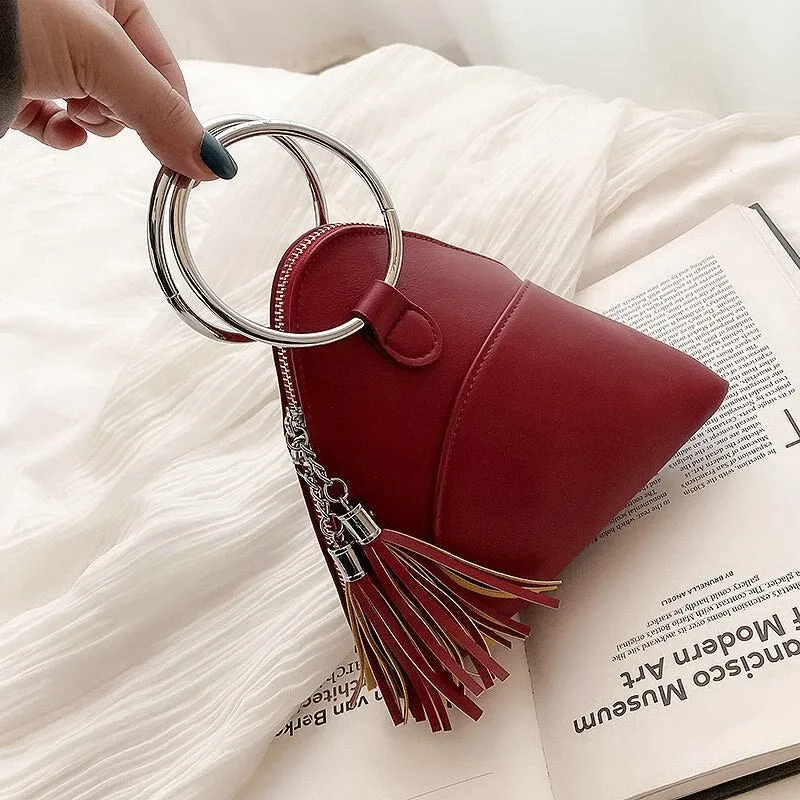 Simple Triangle PU Leather wrist Clutch bag For Women 2021 Mini Handbags and Purses Fashion Iron ring Handle tassel Chain Design