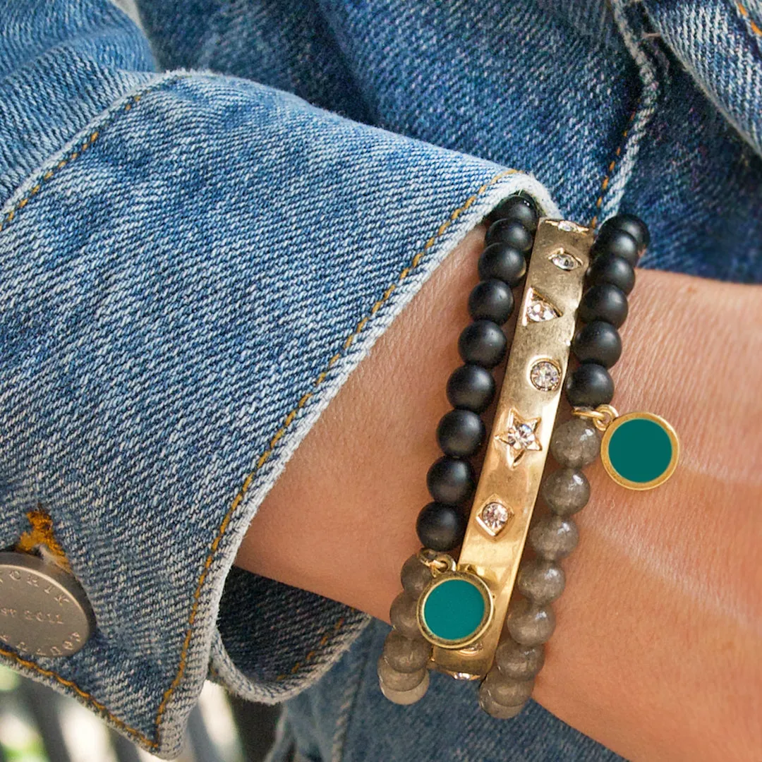 teal beaded bracelet with disc charm