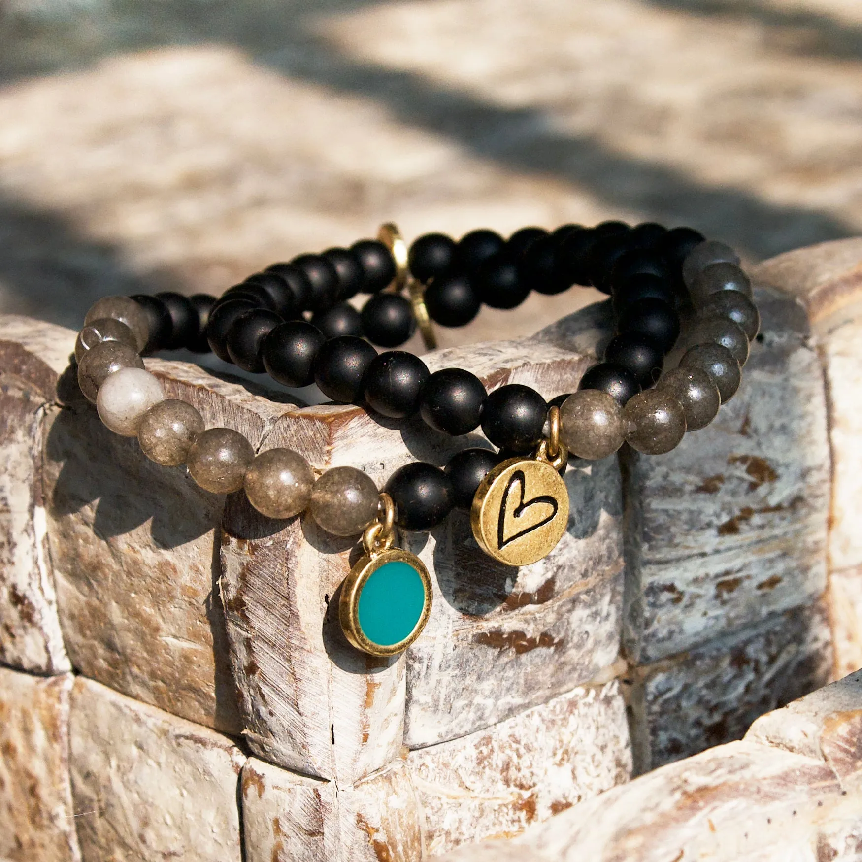 teal beaded bracelet with disc charm