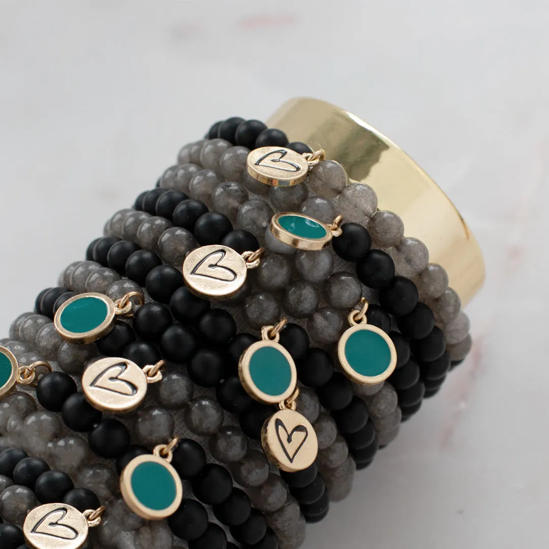 teal beaded bracelet with disc charm