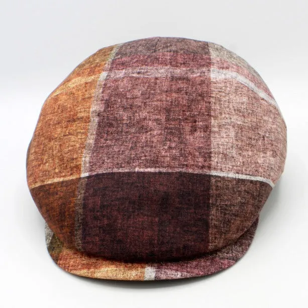 The "Big Plaid - Reds” Flat Cap by Hologramme Paris